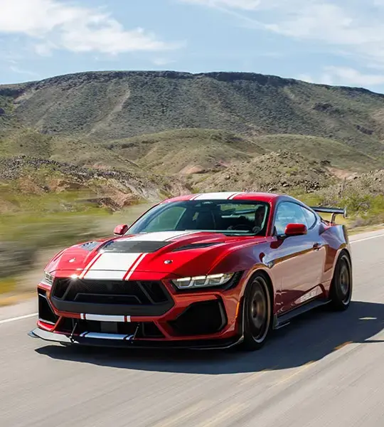 Shelby Cobra cruising on open highway